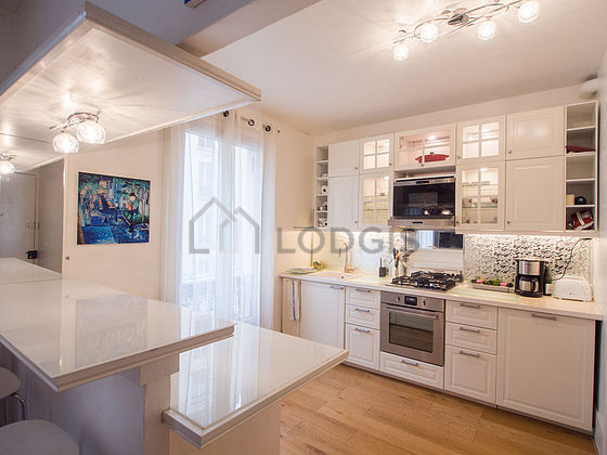 Kitchen where you can have dinner for 2 person(s) equipped with washing machine, dryer, refrigerator, extractor hood