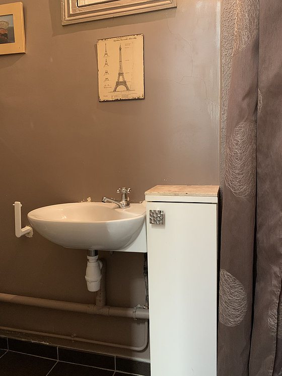 Bathroom equipped with cupboard