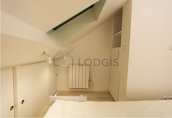 Bright bedroom equipped with fan