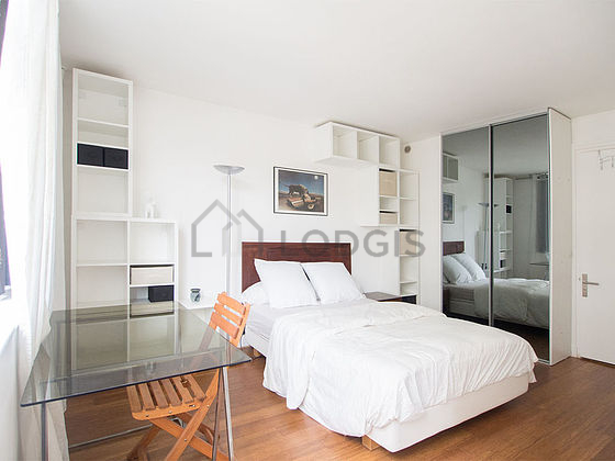 Bedroom with wooden floor