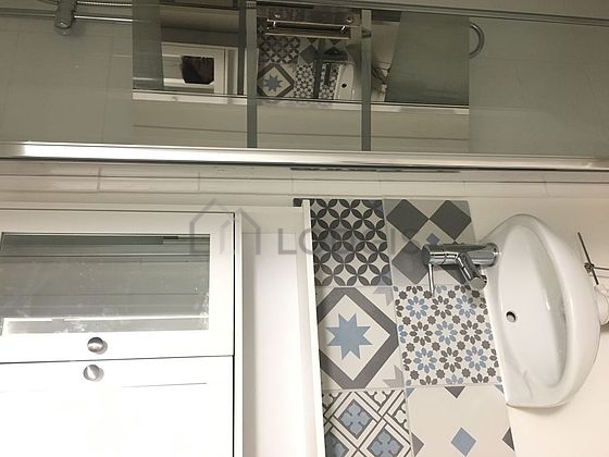 Bathroom equipped with cupboard