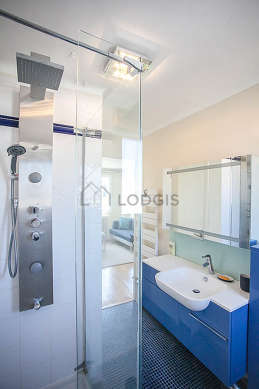 Beautiful and bright bathroom with windows and with tilefloor