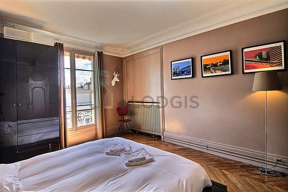 Bedroom with wooden floor