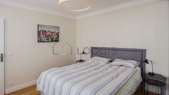 Bedroom with wooden floor
