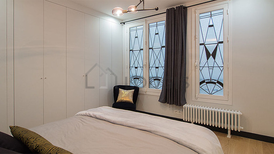 Bedroom with wooden floor