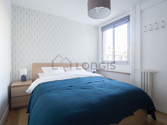 Bedroom with wooden floor