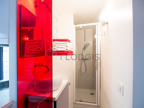 Pleasant and bright bathroom with tile floor