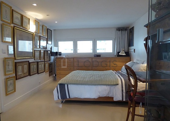 Bedroom with concrete floor
