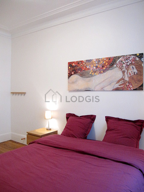 Bedroom with wooden floor