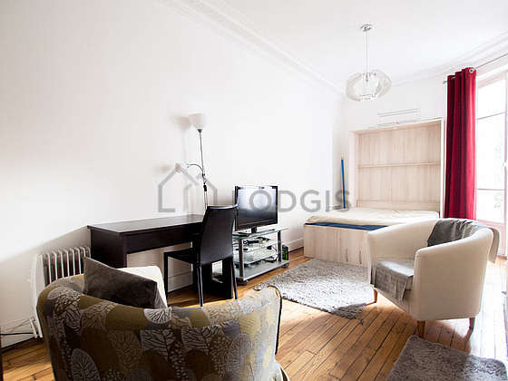 Very quiet living room furnished with 1 murphy bed(s) of 140cm, tv, 1 armchair(s), 1 chair(s)