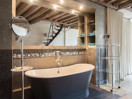 Bathroom equipped with shelves