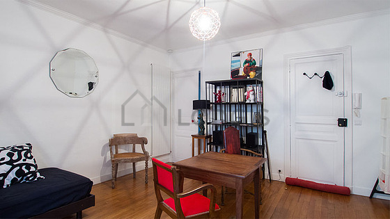 Quiet living room furnished with 2 bed(s) of 80cm, tv, hi-fi stereo