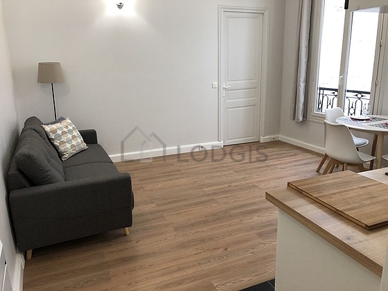 Quiet living room furnished with sofa, 4 chair(s)