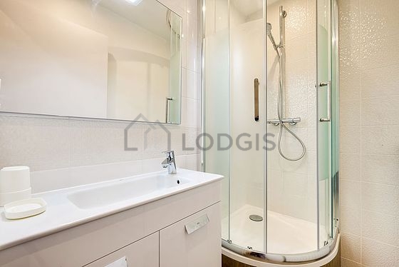 Pleasant and very bright bathroom with wooden floor