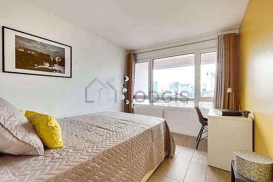 Bedroom with wooden floor