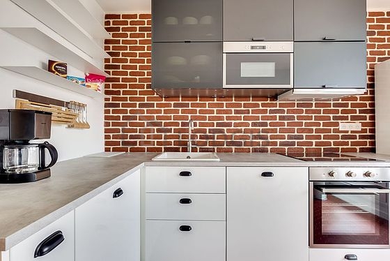 Kitchen where you can have dinner for 4 person(s) equipped with dishwasher, hob, refrigerator, crockery