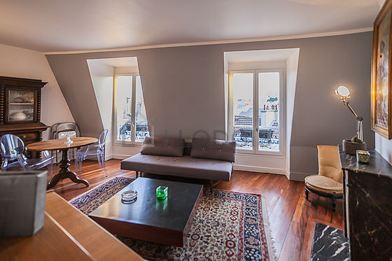 Very quiet living room furnished with sofa, 1 armchair(s), 4 chair(s)