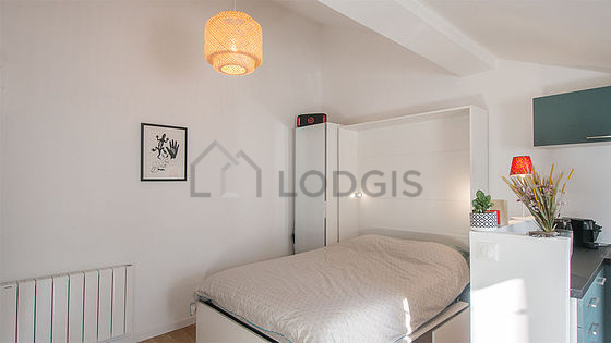 Quiet living room furnished with 1 murphy bed(s) of 140cm, tv, hi-fi stereo, closet