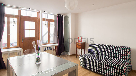 Quiet living room furnished with sofa, 1 chair(s)