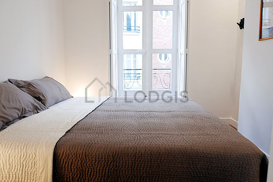 Bedroom with double-glazed windows facing the road