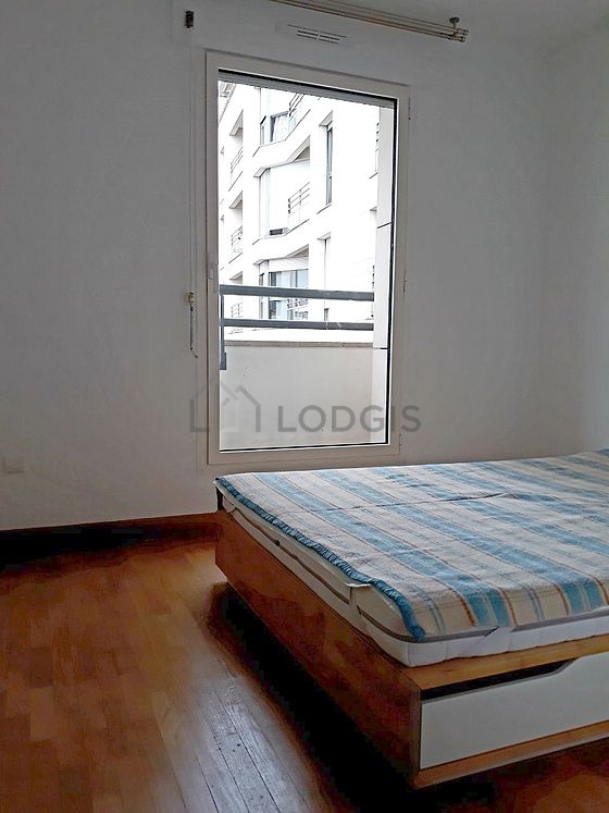 Chambre de 10m² avec du parquet au sol