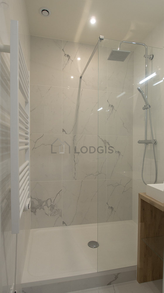 Pleasant and bright bathroom with tile floor