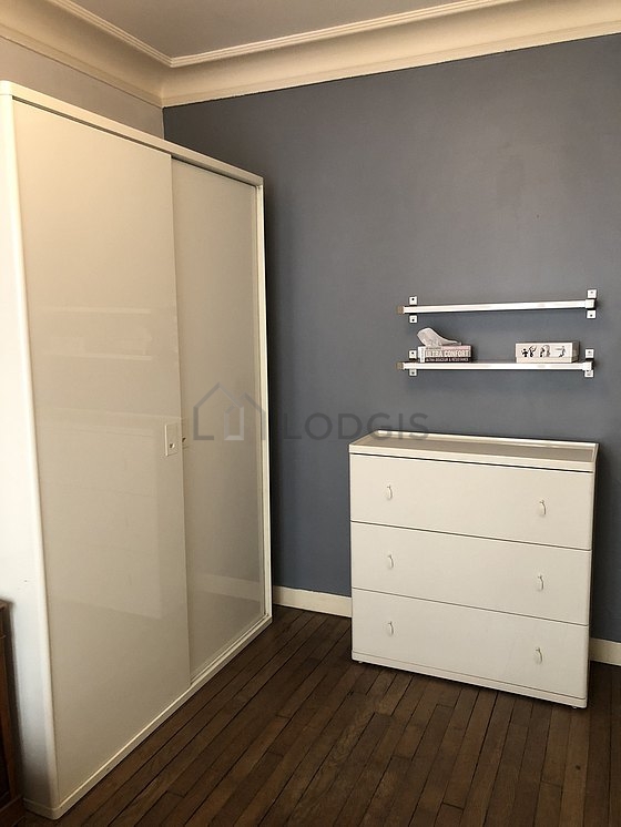 Bedroom with wooden floor