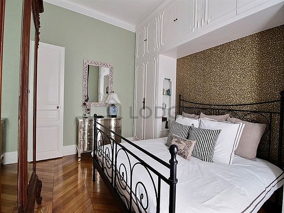 Bedroom with wooden floor