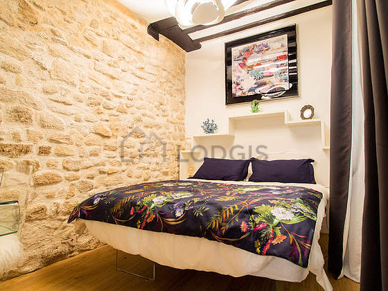 Bedroom with wooden floor