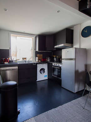 Kitchen where you can have dinner for 4 person(s) equipped with washing machine, refrigerator, extractor hood, crockery