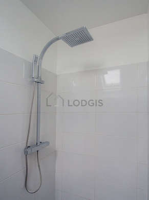 Bathroom equipped with separate shower, towel drying radiator