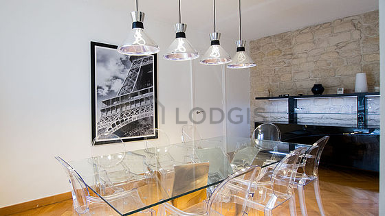 Dining room equipped with dining table, sideboard