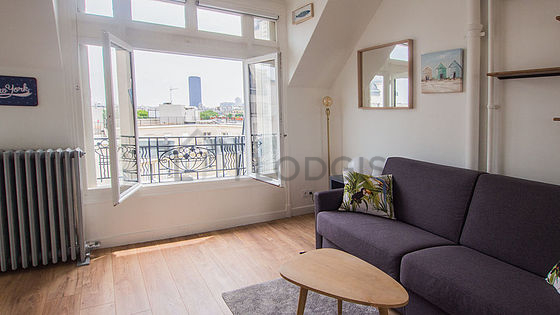 Very quiet living room furnished with 1 sofabed(s) of 140cm, sofa, closet, 1 chair(s)