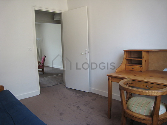 Bedroom with the carpeting floor