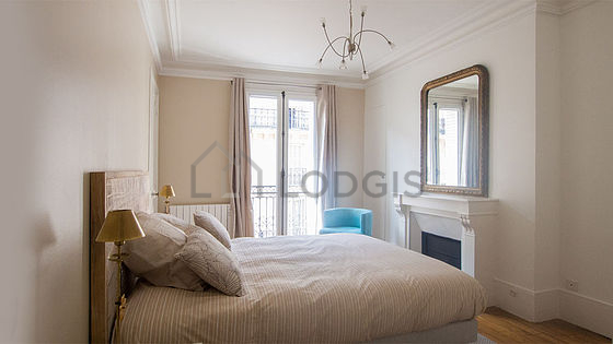 Bedroom with wooden floor
