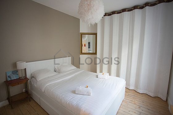 Bedroom with wooden floor