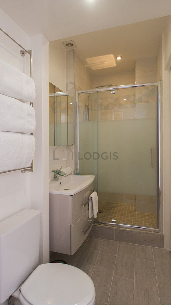 Pleasant and bright bathroom with tile floor