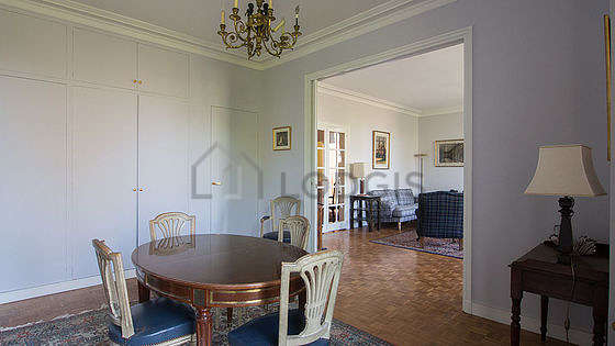 Dining room equipped with dining table, sideboard