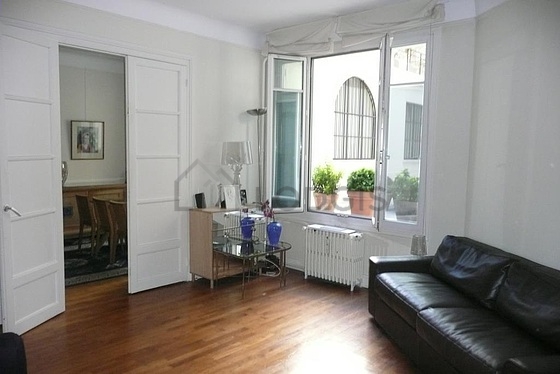 Very quiet living room furnished with 1 sofabed(s) of 160cm, hi-fi stereo, closet, 1 chair(s)