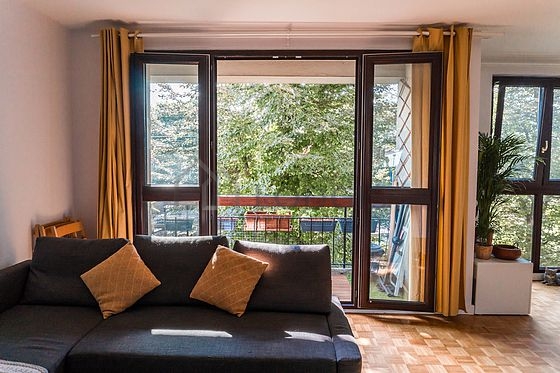 Very quiet living room furnished with 1 sofabed(s) of 160cm, tv, storage space, 1 chair(s)