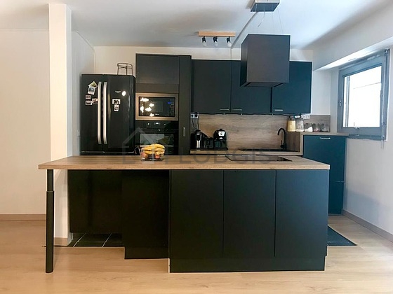 Kitchen equipped with dishwasher, hob, refrigerator, freezer