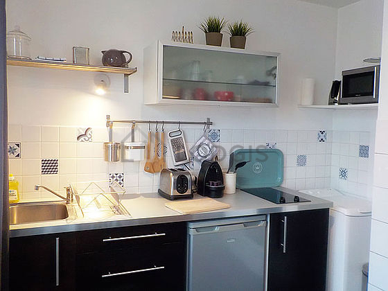 Bright kitchen facing the courtyard
