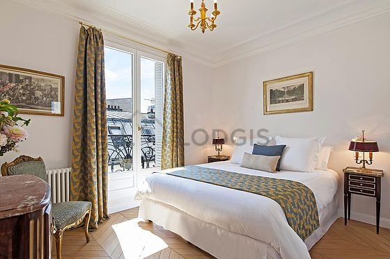 Bedroom with wooden floor