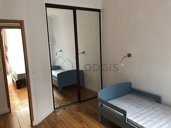 Bedroom with wooden floor