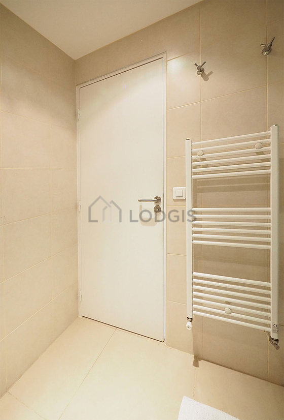 Bathroom equipped with shelves