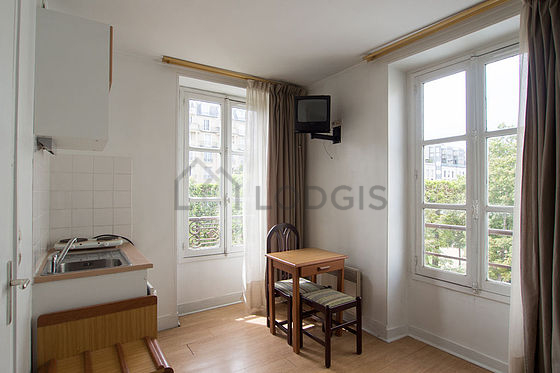 Quiet living room furnished with 1 sofabed(s) of 140cm, tv, wardrobe, cupboard