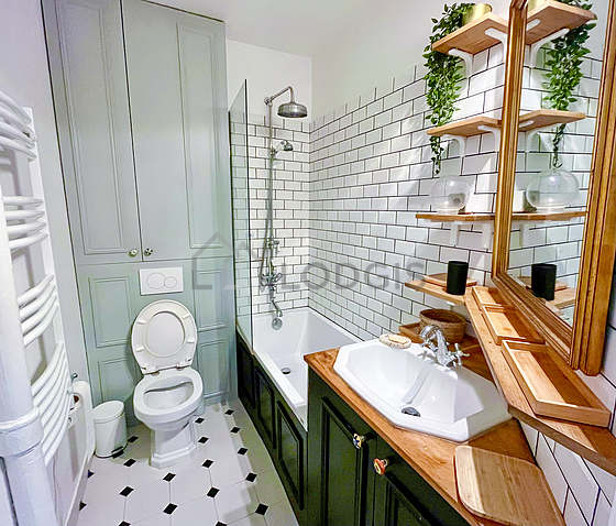 Pleasant bathroom with tile floor