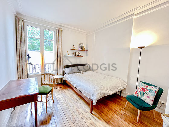 Bedroom with wooden floor