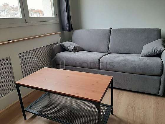 Very quiet living room furnished with 1 sofabed(s) of 140cm, sofa, coffee table, 1 chair(s)