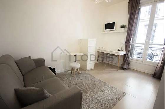 Living room furnished with 1 sofabed(s) of 140cm, tv, hi-fi stereo, wardrobe